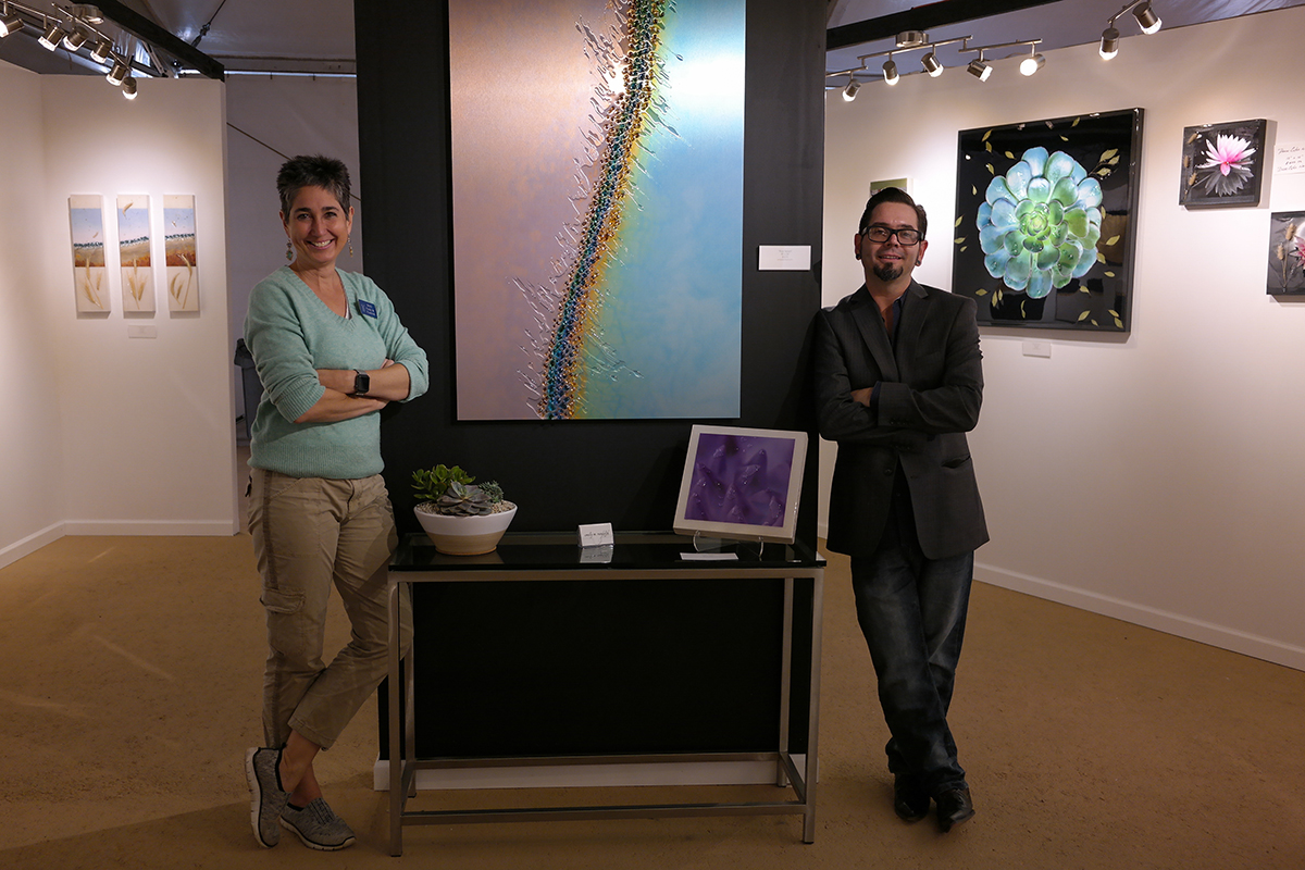 Emily and Mike at Celebration of Fine Art showing off HD Printing
