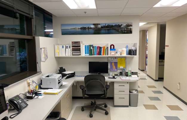 Michigan Reproductive Medicine ChromaLuxe aluminum prints over desk